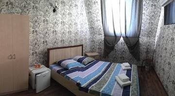 Фото номера Двухместный номер с 1 двуспальной кроватью и дополнительной кроватью Гостиница Guest house on pereulok Pionerskiy 4V г. Новомихайловский 4
