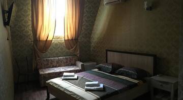 Фото номера Двухместный номер Делюкс с 1 кроватью и ванной Гостиница Guest house on pereulok Pionerskiy 4V г. Новомихайловский 6